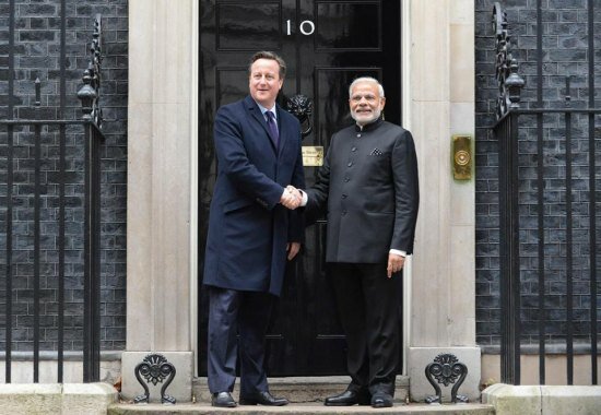 Narendra Modi UK visit 2015: Pics of electric atmosphere at Wembley Stadium for 'UKWelcomesModi' community reception The Indian PM poses with British PM at the official UK PM residence 10 Downing Street